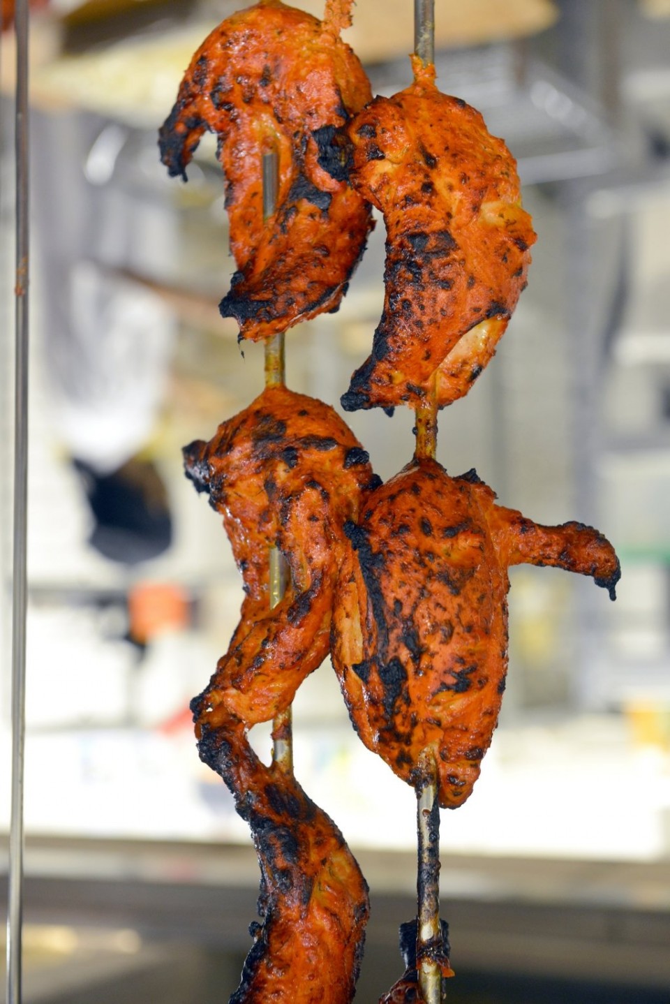 Chicken on the bone marinated with Indian spices, yogurt, ginger, garlic and grilled in the tandoor
